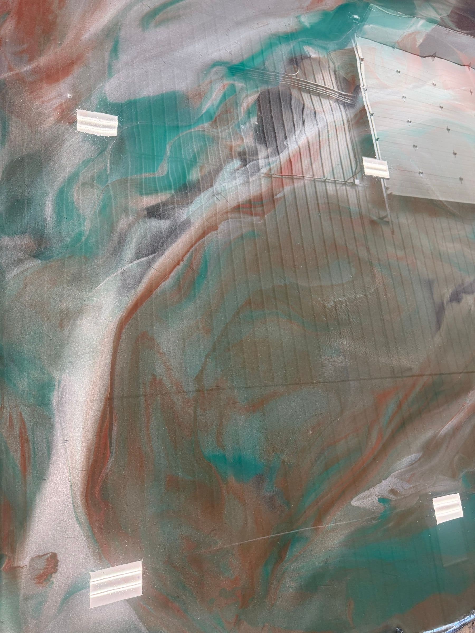 Teal and copper metallic epoxy floor by Colin Coatings, Des Moines, Iowa