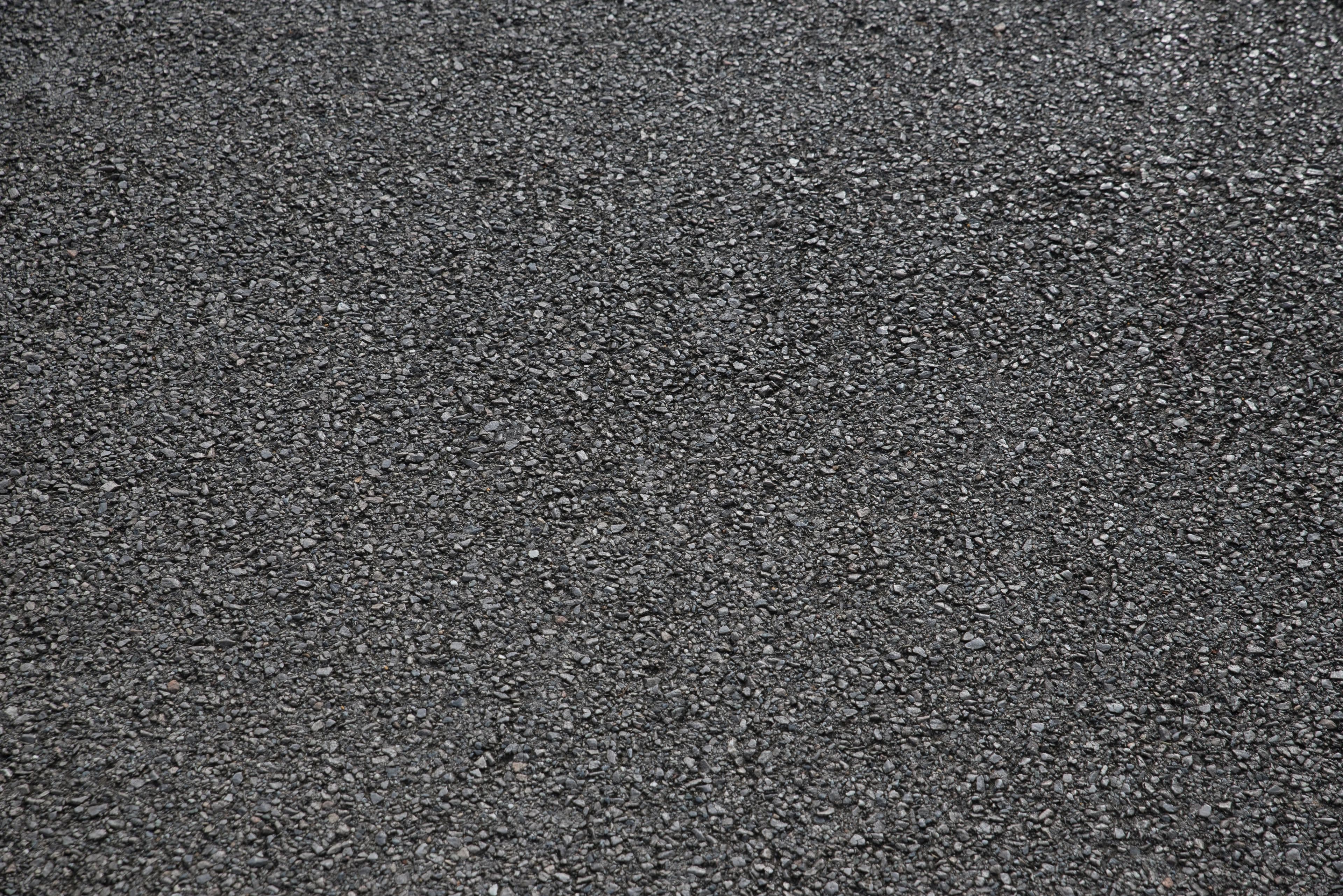 Dark flake epoxy floor close-up by Colin Coatings, Des Moines, Iowa