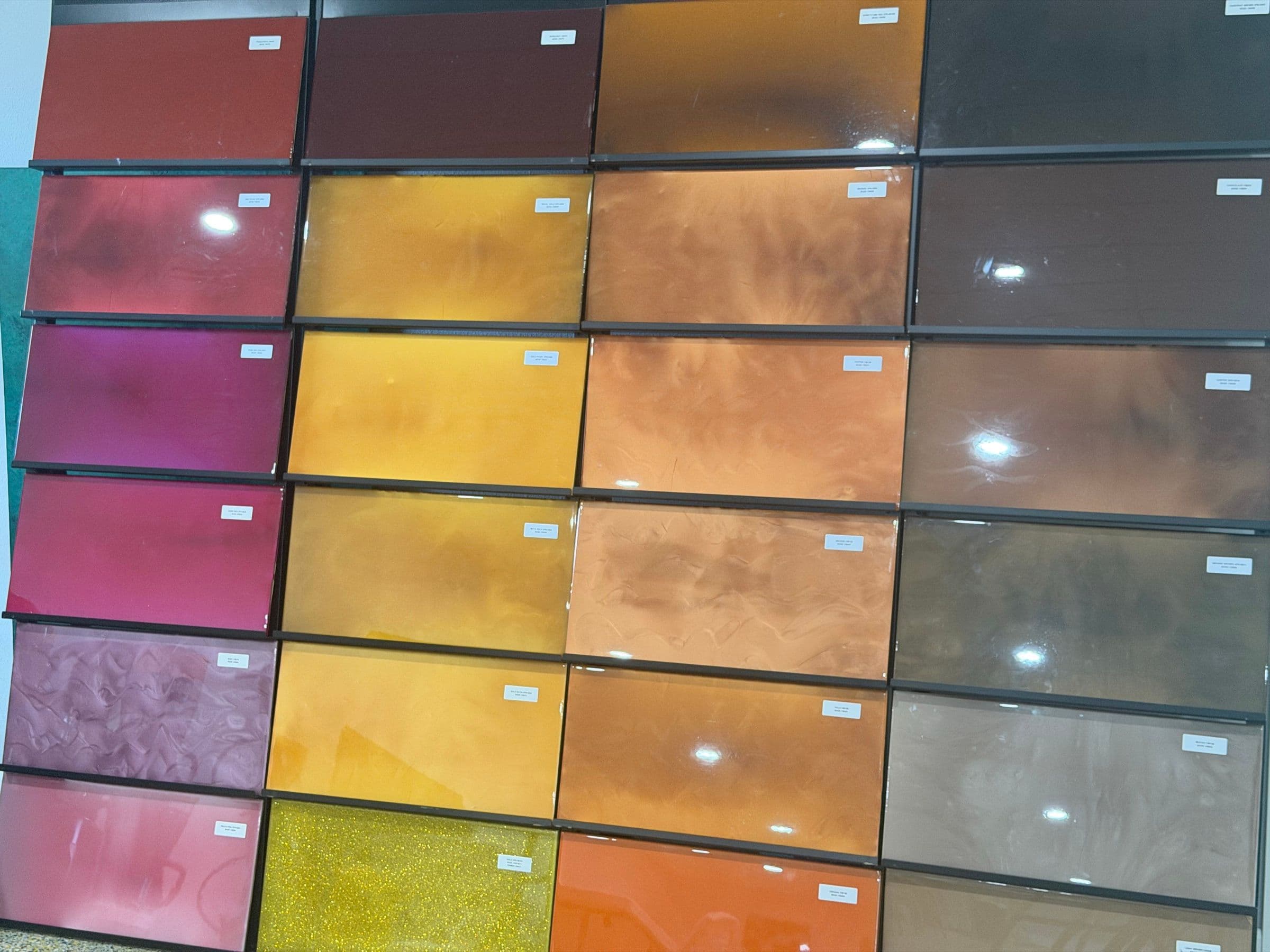 Metallic and flake floor colour samples on a display rack by Colin Coatings, Des Moines, Iowa