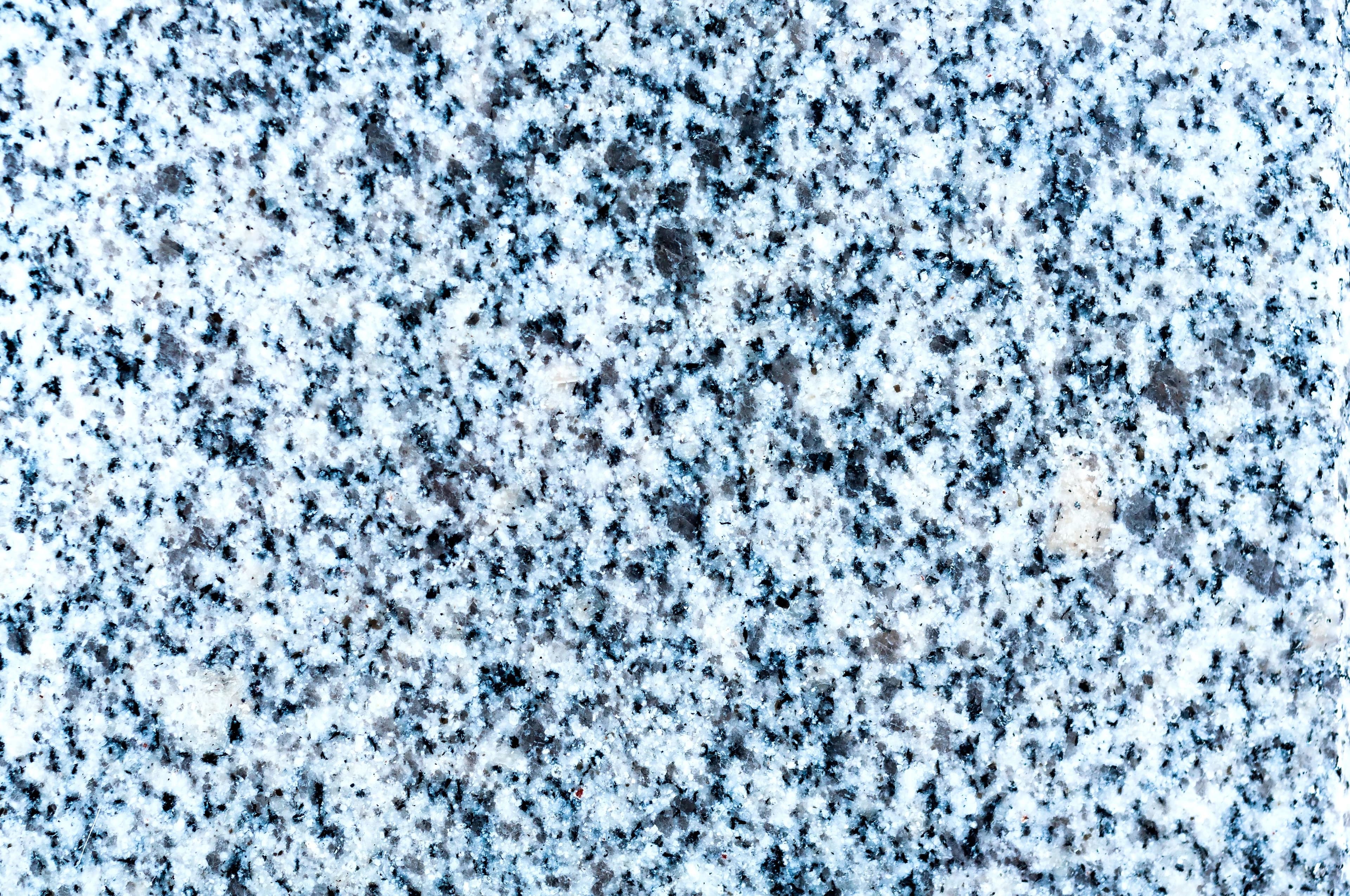 Gray flake floor coating close-up by Colin Coatings, Des Moines, Iowa